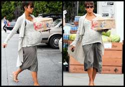 heavily pregnant halle berry on a shopping spree for unborn baby see pics