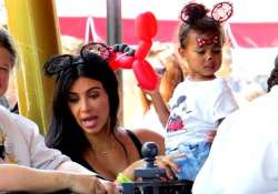 kim kardashian kanye west celebrate daughter s second b day at disneyland see pics