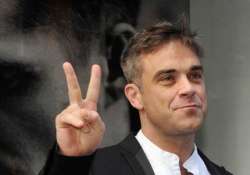 robbie williams plans to quit music for a proper job