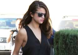 selena gomez faces crticism for topless photoshoot