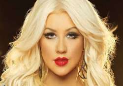 christina aguilera poses topless