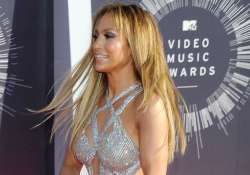 jennifer lopez hires manny for son