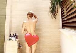 miley cyrus posts a nude picture of her in a shower