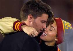 miley cyrus cheers rumoured boyfriend s college team