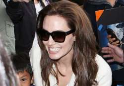 angelina jolie survives a car crash