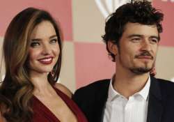 miranda kerr orlando bloom still close to each other