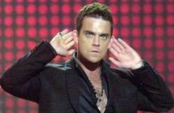 robbie williams bares bottom for 20 pounds