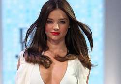 miranda kerr spotted kissing billionaire