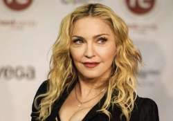 madonna accused of using hebdo s name to promote album