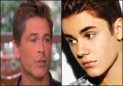 justin bieber knows his dark secret rob lowe