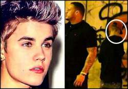 justin bieber caught scrawling graffiti in rio de janeiro see pics