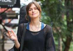 keira knightley enjoys reading trashy novels on sets