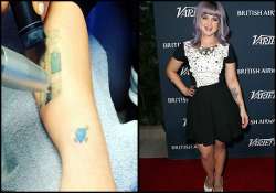 kelly osbourne getting rid of tattoos