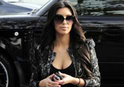 kim kardashian shows off ample cleavage even at kids event