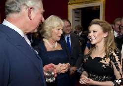 kylie minogue entertains royals at st james palace