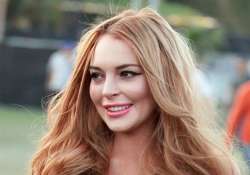 lindsay lohan ok after wreck on coastal highway