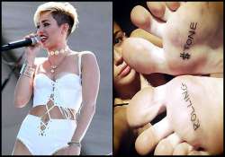 miley cyrus gets rolling stone tattoo