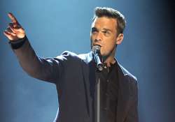 robbie williams to quit take that again