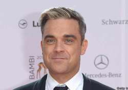 robbie williams eyes musical biopic