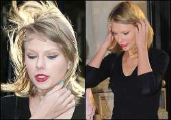 taylor swift s hair gets messed up by sudden gust see pics