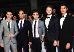 the wanted band members now face alcohol ban