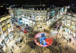 x men posters beamed on london s oxford circus