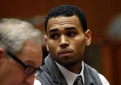 chris brown gets positive probation report