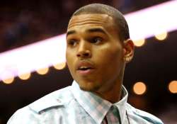 chris brown s neighbour threatens to shoot him