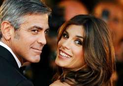 george clooney s ex happy for him alamuddin