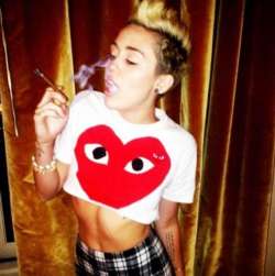 miley cyrus quits smoking see pics