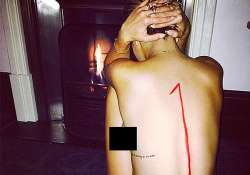 rita ora strips to celebrate song s success