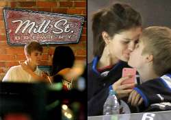 justin beiber selena gomez reunite hug and kiss each other see pics