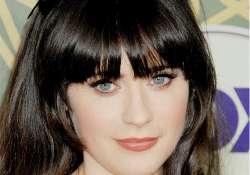 zooey deschanel bags major label record deal