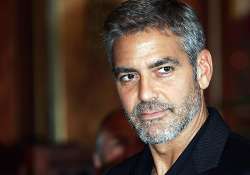 george clooney never repeats socks