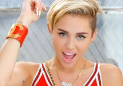 miley cyrus praises ad campaign featuring gay couple