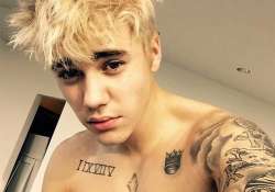 jutsin bieber s new shinny blonde makeover