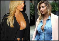 hottest mom of town kim kardashian flaunts bosoms see pics