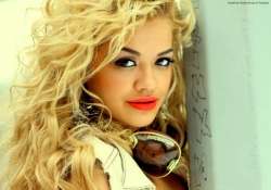 red lipstick helps make an impact rita ora