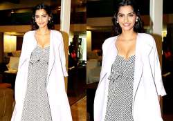 sonam kapoor flaunts her cleavage looks dewy hot see pics