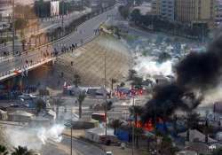 bahrain forces overrun protest camp six dead