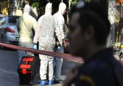 bomb explodes at athens shopping mall two wounded