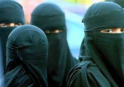 burqa clad women should show face when asked to witness their signature says australian body