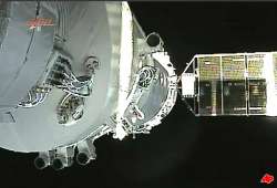 chinese craft returns from space docking mission