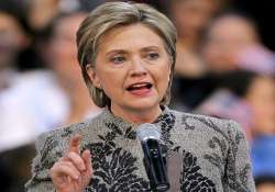 clinton in afghanistan for talks with karzai