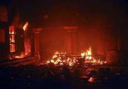 curfew in larkana muslim mobs set fire to hindu temple dharmashala shops