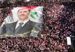 defiant assad brushes off threat of sanctions