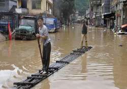 downpours leave 14 dead several missing in china