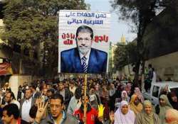 egypt s morsi faces trial for prison break murder