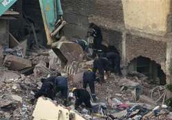 egypt building collapse kills three