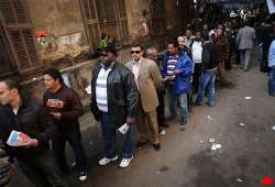 egyptians wait in long lines to elect a parliament